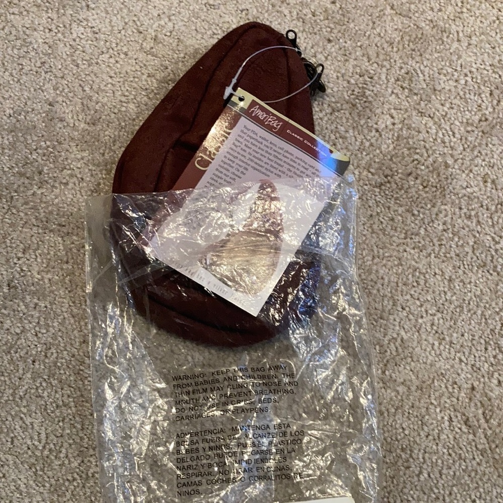 Brown ameribag with strap purse. Brand new in package